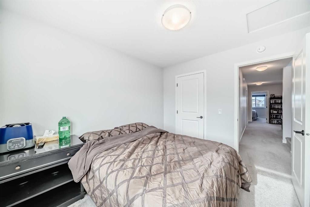 160 Lucas Common Nw, Calgary, AB - Indoor Photo Showing Bedroom