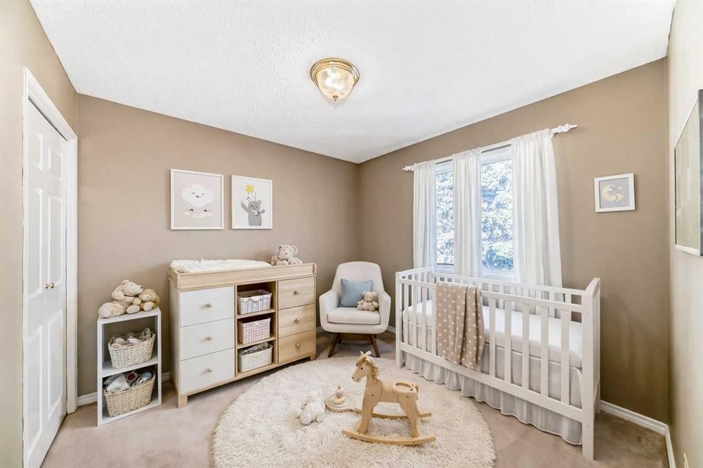 6007 Dalcastle Crescent Nw, Calgary, AB - Indoor Photo Showing Bedroom