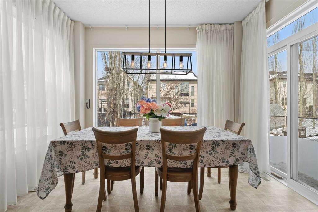 98 Cougarstone Close Sw, Calgary, AB - Indoor Photo Showing Dining Room