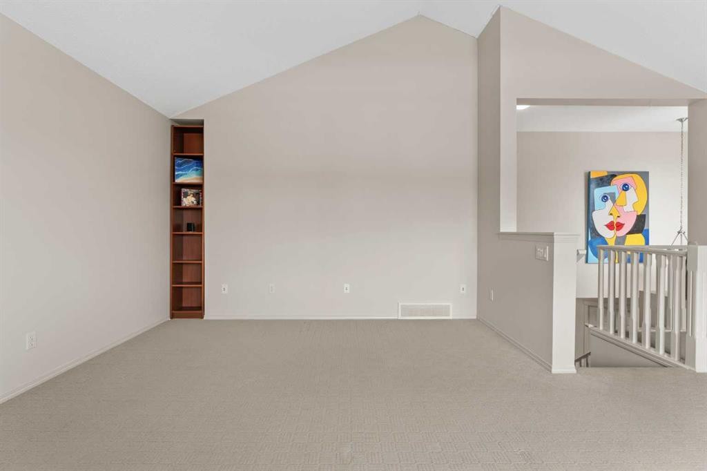 98 Cougarstone Close Sw, Calgary, AB - Indoor Photo Showing Other Room