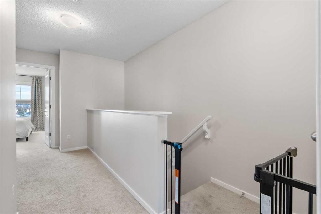 56 Legacy Main Street Se, Calgary, AB - Indoor Photo Showing Other Room