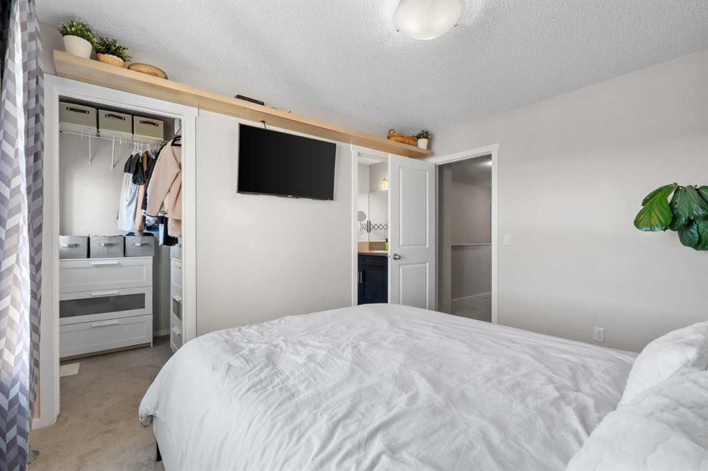 56 Legacy Main Street Se, Calgary, AB - Indoor Photo Showing Bedroom