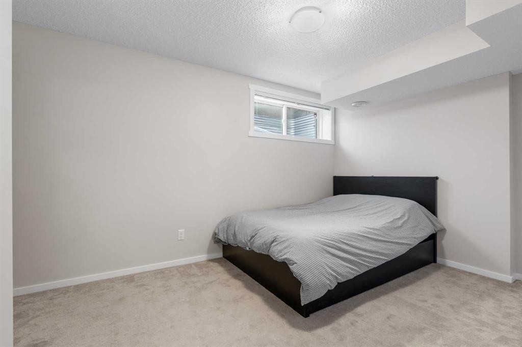 56 Legacy Main Street Se, Calgary, AB - Indoor Photo Showing Bedroom