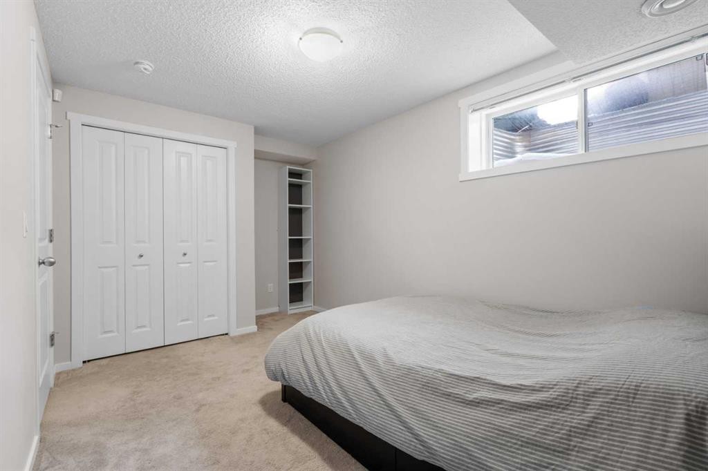 56 Legacy Main Street Se, Calgary, AB - Indoor Photo Showing Bedroom
