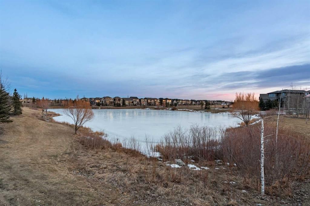 56 Legacy Main Street Se, Calgary, AB - Outdoor With Body Of Water With View