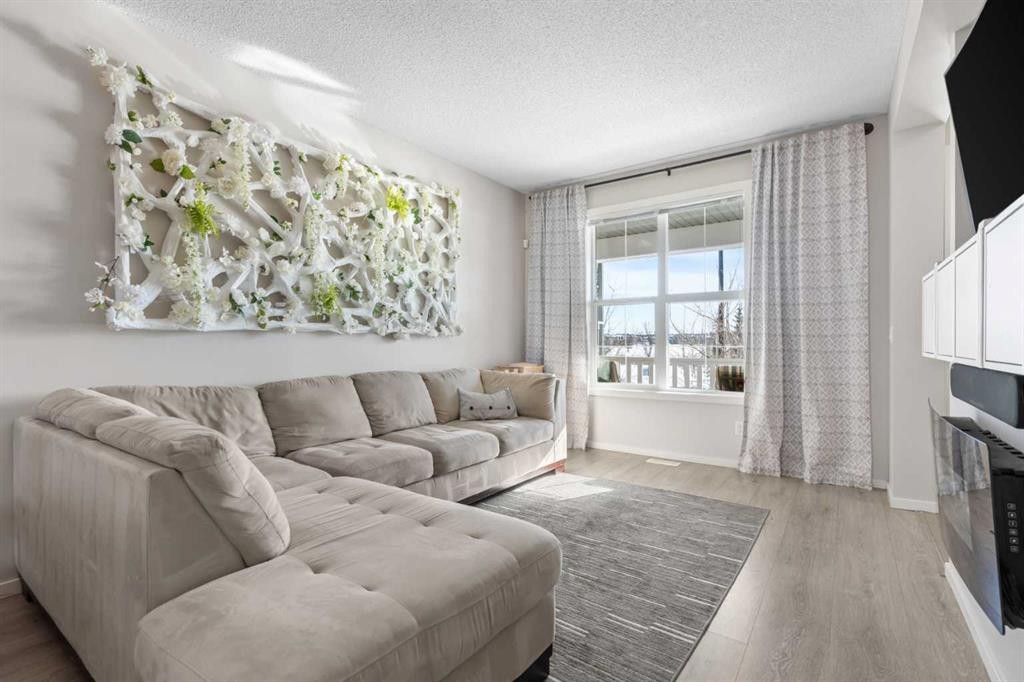 56 Legacy Main Street Se, Calgary, AB - Indoor Photo Showing Living Room