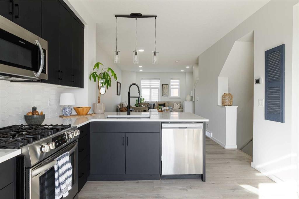 74 Spring Willow Close Sw, Calgary, AB - Indoor Photo Showing Kitchen With Upgraded Kitchen