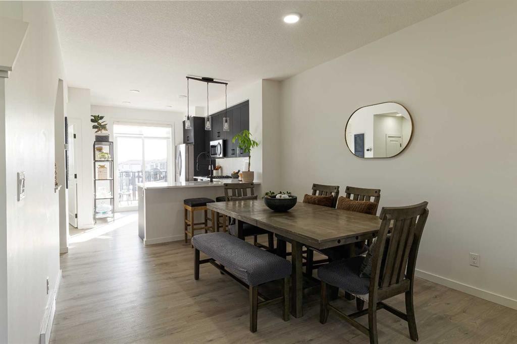 74 Spring Willow Close Sw, Calgary, AB - Indoor Photo Showing Dining Room