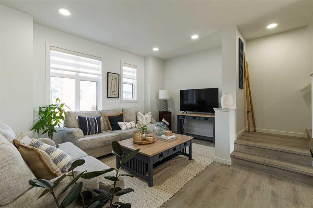 74 Spring Willow Close Sw, Calgary, AB - Indoor Photo Showing Living Room