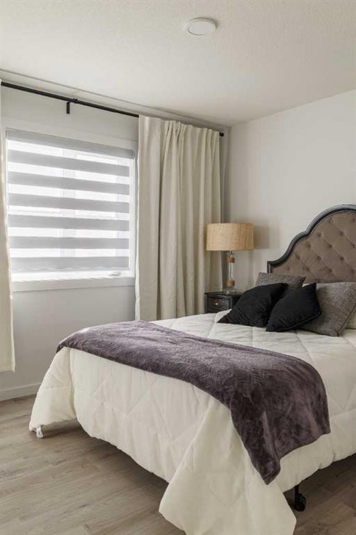 74 Spring Willow Close Sw, Calgary, AB - Indoor Photo Showing Bedroom