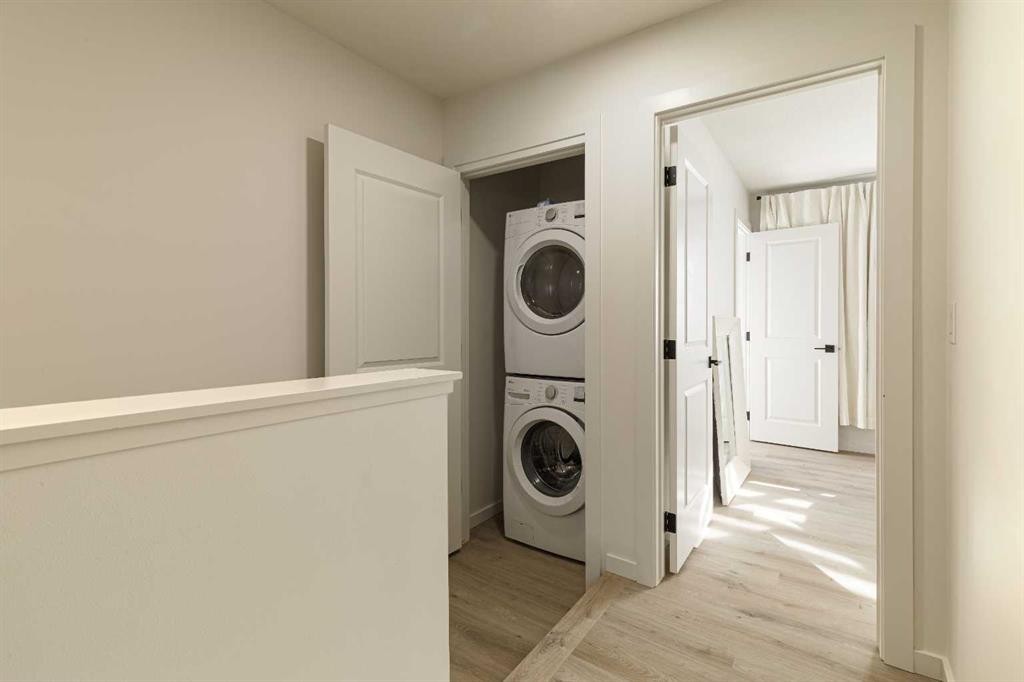 74 Spring Willow Close Sw, Calgary, AB - Indoor Photo Showing Laundry Room