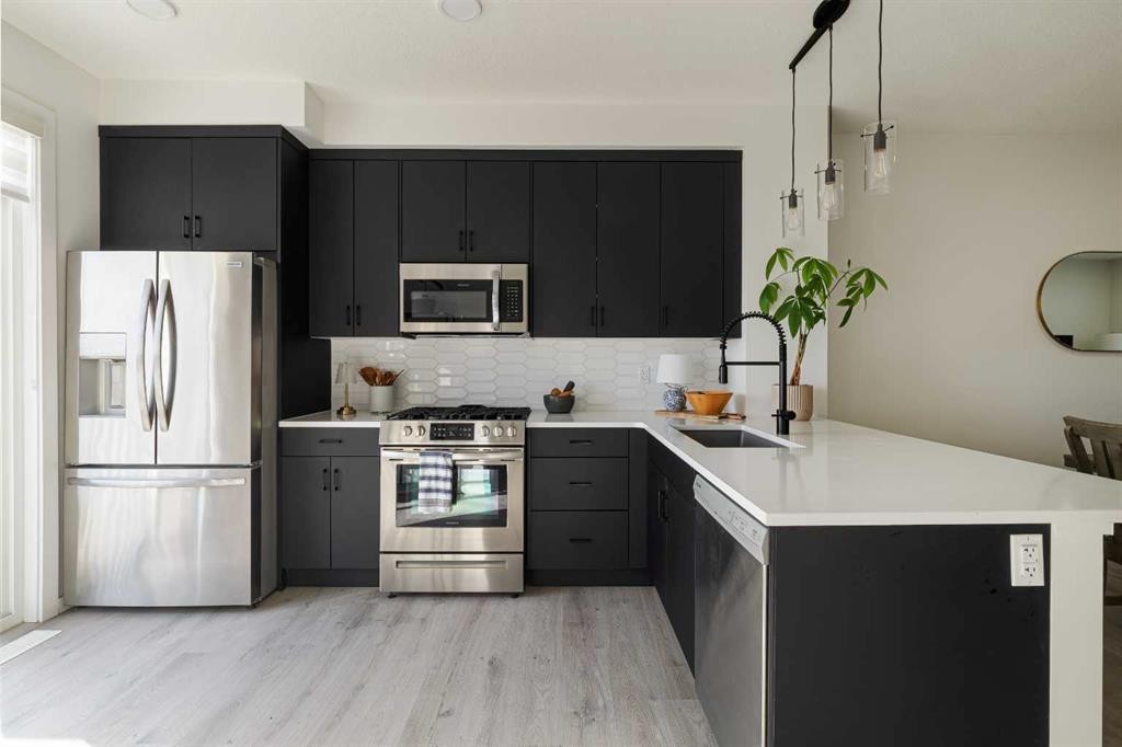 74 Spring Willow Close Sw, Calgary, AB - Indoor Photo Showing Kitchen With Stainless Steel Kitchen With Upgraded Kitchen