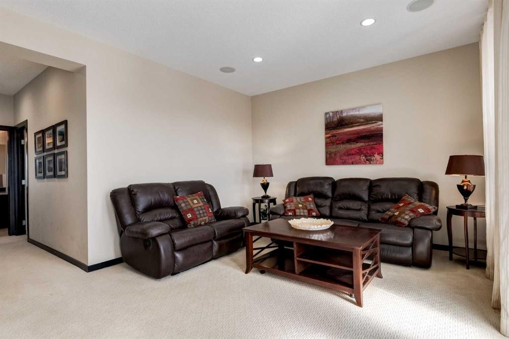 80 Auburn Springs Boulevard Se, Calgary, AB - Indoor Photo Showing Living Room