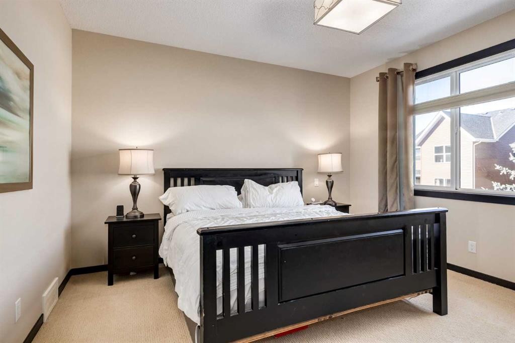 80 Auburn Springs Boulevard Se, Calgary, AB - Indoor Photo Showing Bedroom