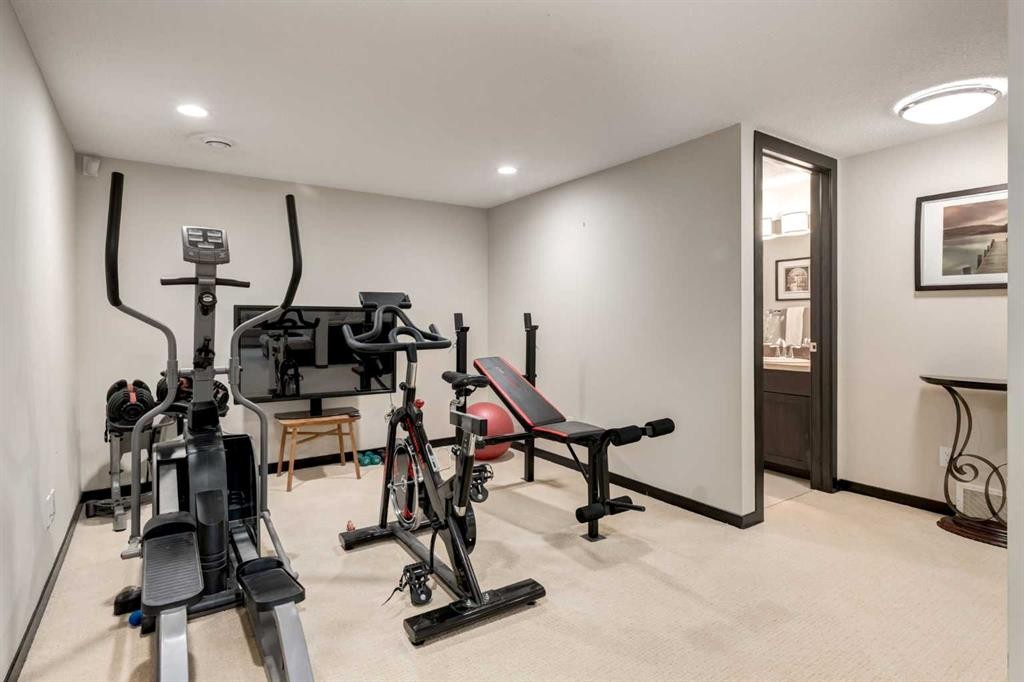 80 Auburn Springs Boulevard Se, Calgary, AB - Indoor Photo Showing Gym Room
