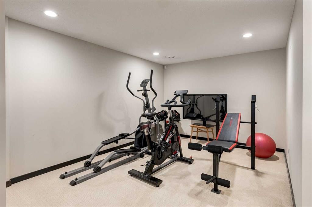 80 Auburn Springs Boulevard Se, Calgary, AB - Indoor Photo Showing Gym Room