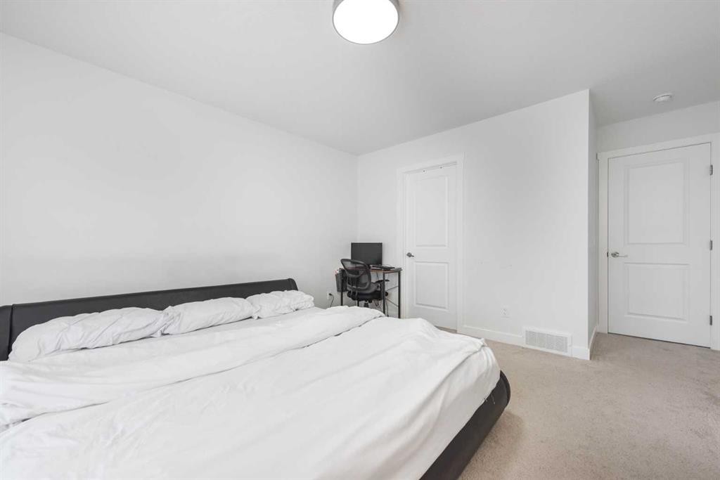308 Sora Terrace Se, Calgary, AB - Indoor Photo Showing Bedroom