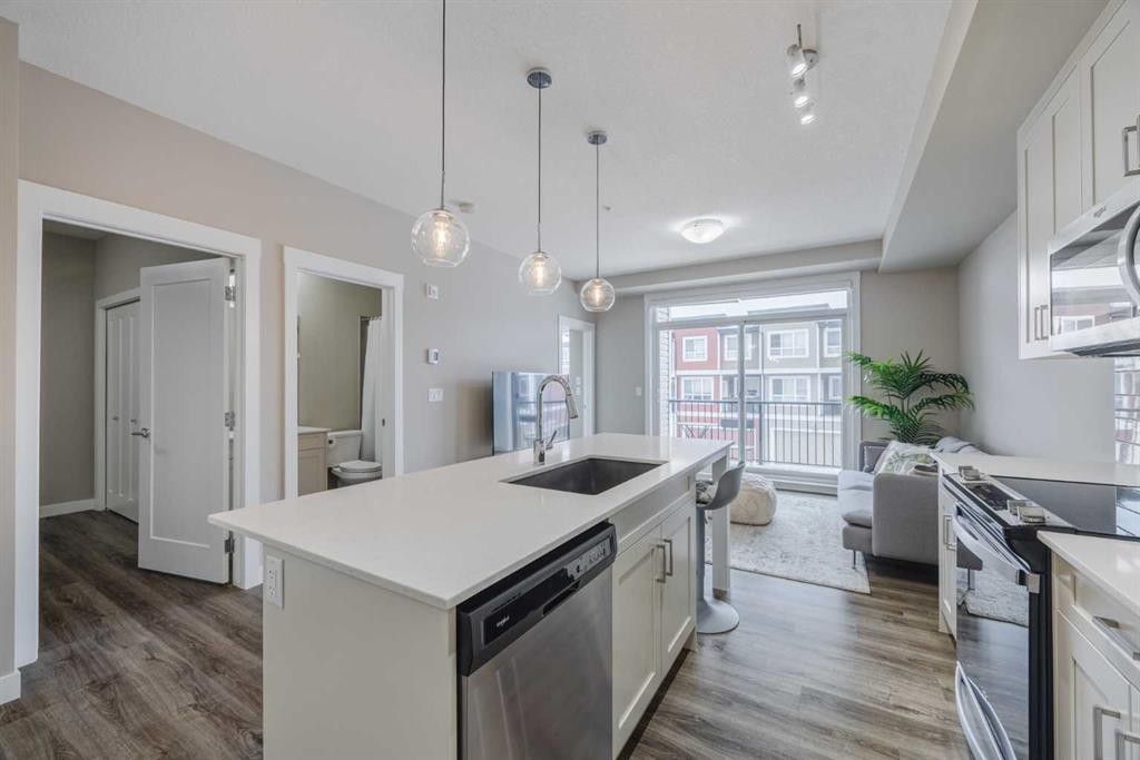 210-25 Walgrove Walk Se, Calgary, AB - Indoor Photo Showing Kitchen With Upgraded Kitchen