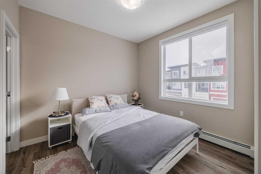 210-25 Walgrove Walk Se, Calgary, AB - Indoor Photo Showing Bedroom