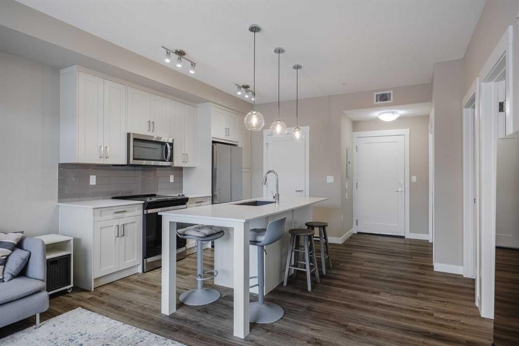 210-25 Walgrove Walk Se, Calgary, AB - Indoor Photo Showing Kitchen With Upgraded Kitchen