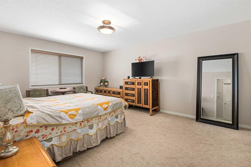 79 Pantego Way Nw, Calgary, AB - Indoor Photo Showing Bedroom