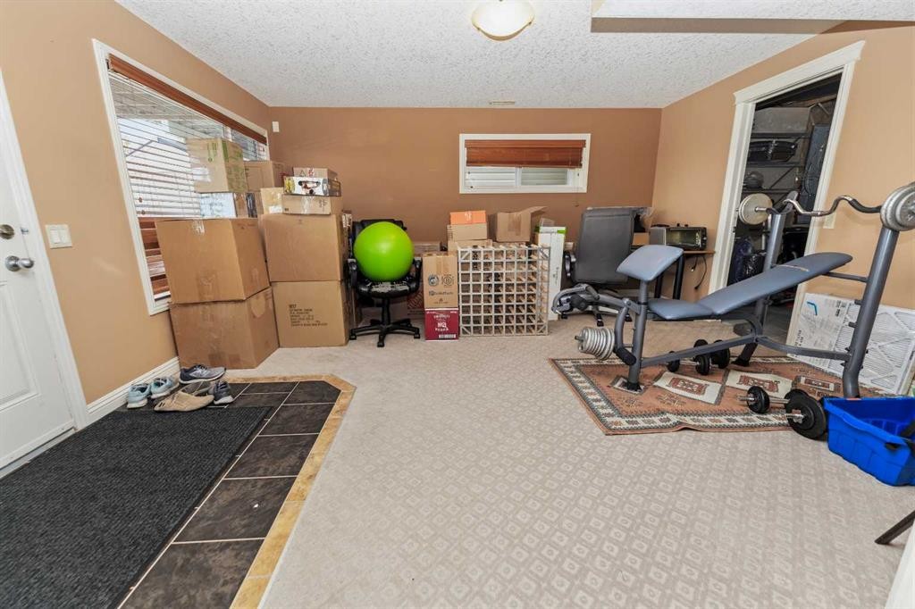 50 Panamount View Nw, Calgary, AB - Indoor Photo Showing Gym Room