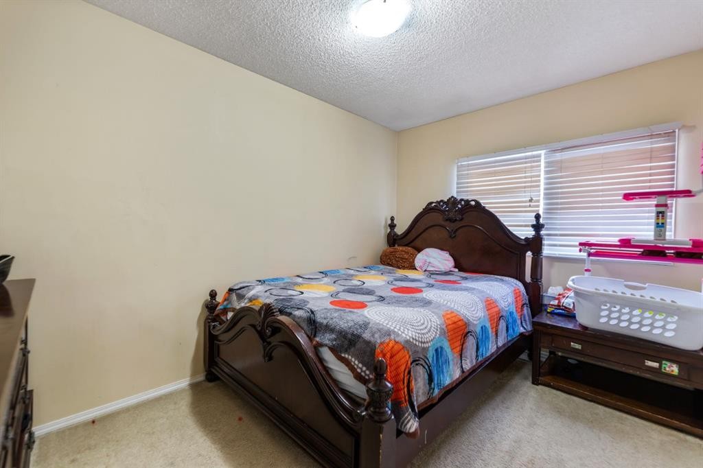 48 Falton Way Ne, Calgary, AB - Indoor Photo Showing Bedroom