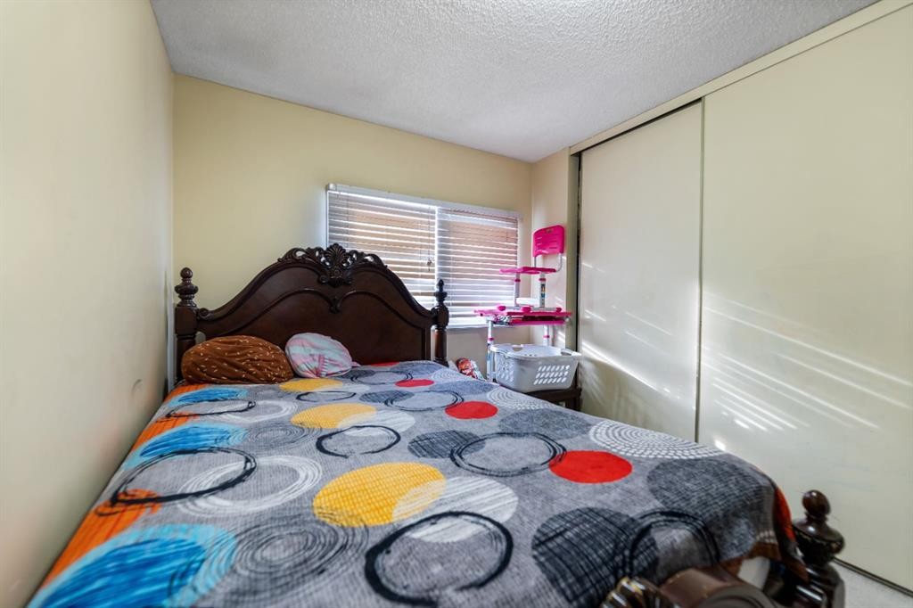 48 Falton Way Ne, Calgary, AB - Indoor Photo Showing Bedroom