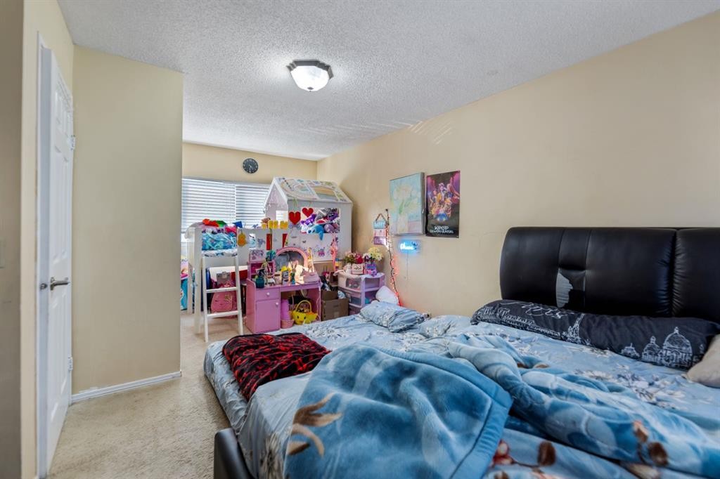 48 Falton Way Ne, Calgary, AB - Indoor Photo Showing Bedroom