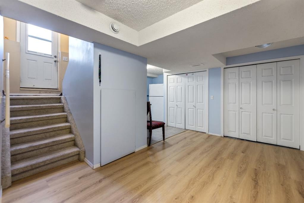 48 Falton Way Ne, Calgary, AB - Indoor Photo Showing Other Room