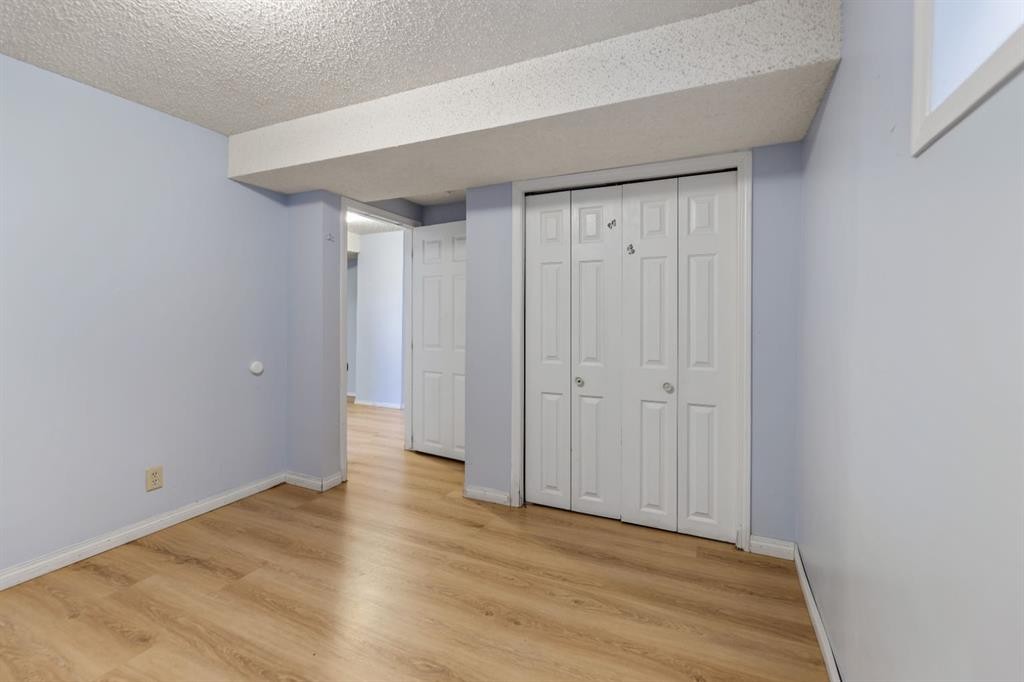 48 Falton Way Ne, Calgary, AB - Indoor Photo Showing Other Room
