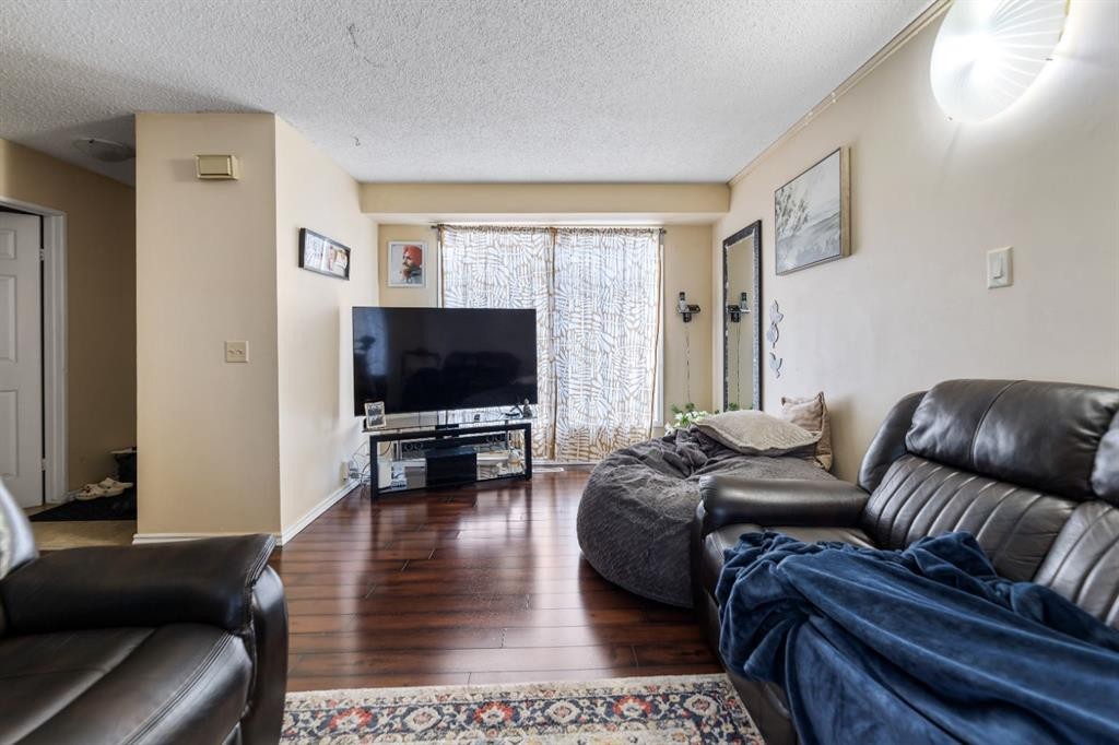 48 Falton Way Ne, Calgary, AB - Indoor Photo Showing Living Room