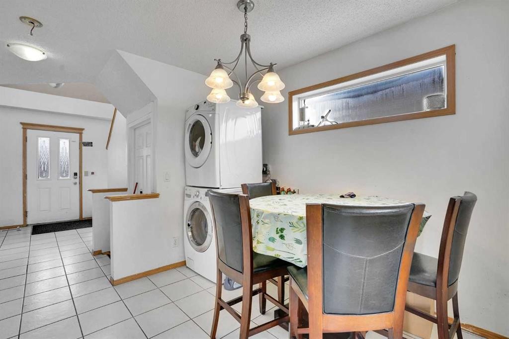 162 Taradale Drive Ne, Calgary, AB - Indoor Photo Showing Laundry Room