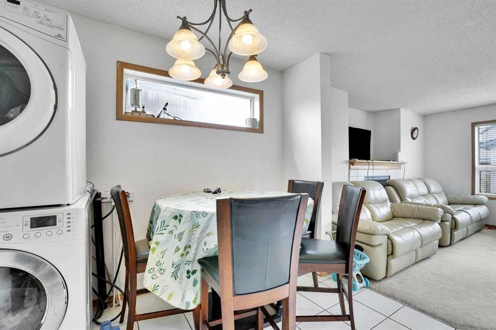 162 Taradale Drive Ne, Calgary, AB - Indoor Photo Showing Laundry Room