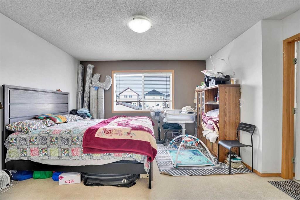 162 Taradale Drive Ne, Calgary, AB - Indoor Photo Showing Bedroom