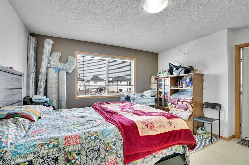 162 Taradale Drive Ne, Calgary, AB - Indoor Photo Showing Bedroom