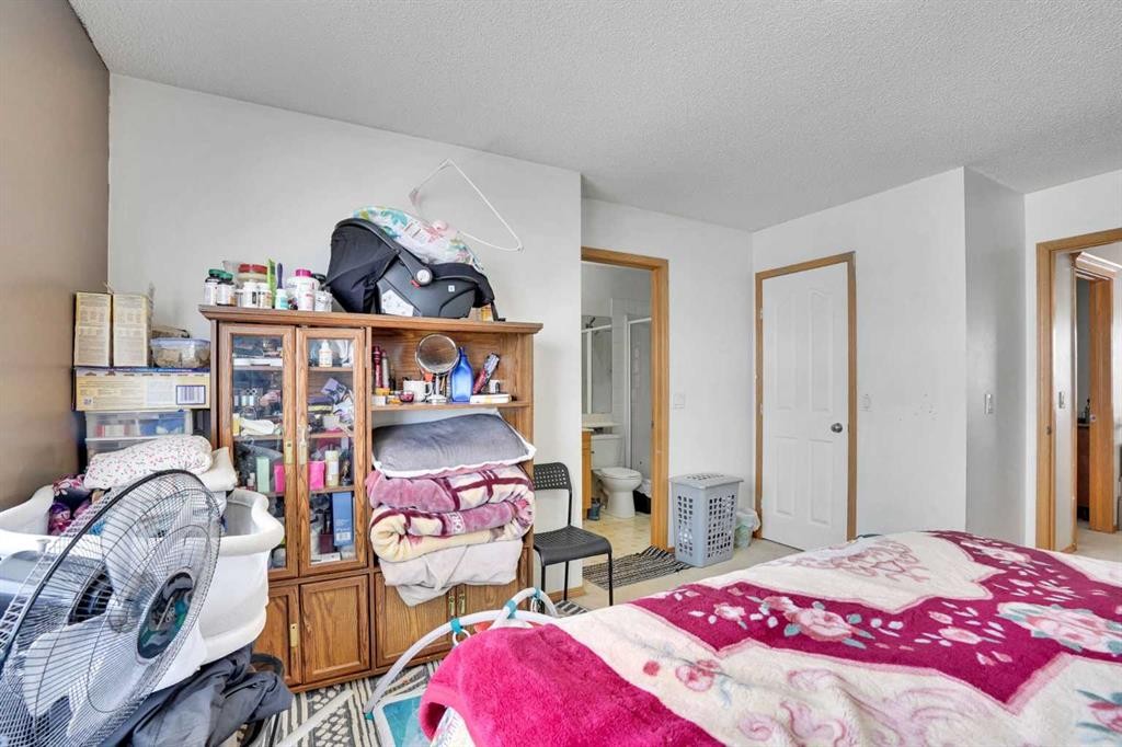 162 Taradale Drive Ne, Calgary, AB - Indoor Photo Showing Bedroom
