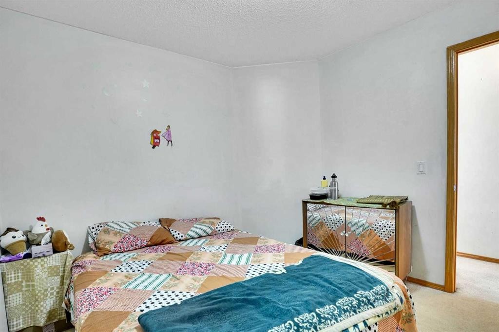 162 Taradale Drive Ne, Calgary, AB - Indoor Photo Showing Bedroom