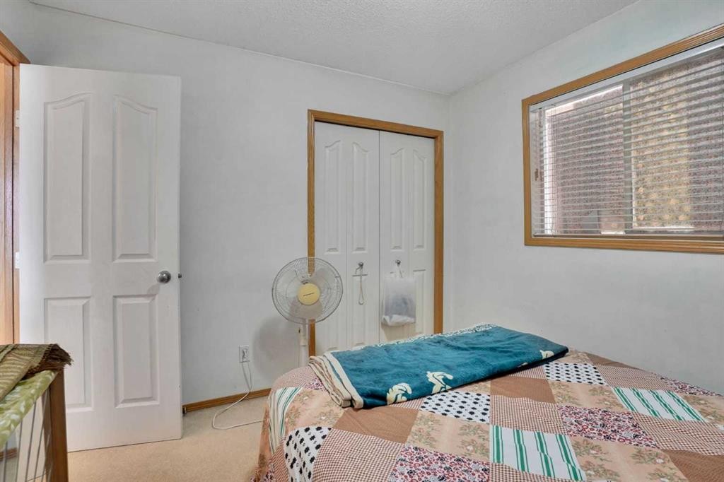 162 Taradale Drive Ne, Calgary, AB - Indoor Photo Showing Bedroom