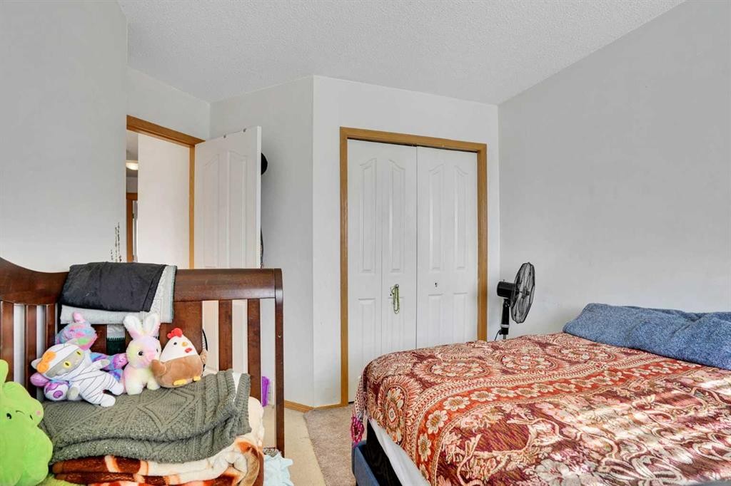 162 Taradale Drive Ne, Calgary, AB - Indoor Photo Showing Bedroom