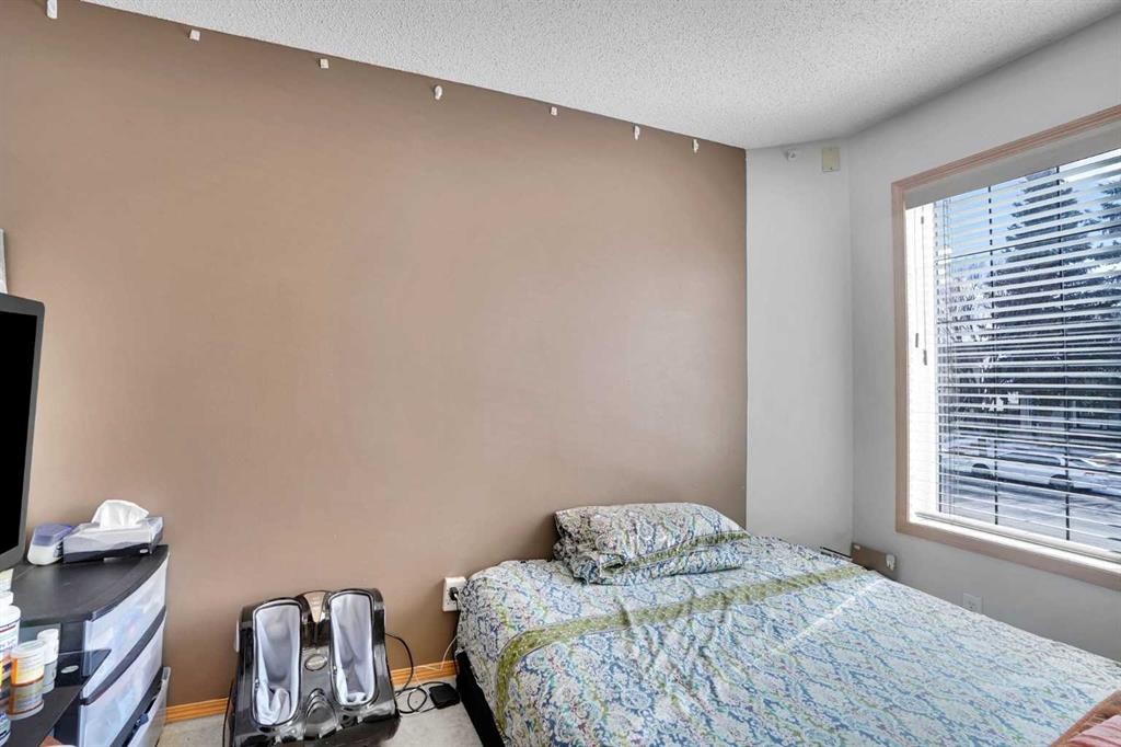 162 Taradale Drive Ne, Calgary, AB - Indoor Photo Showing Bedroom