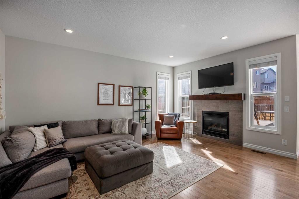 192 Nolanhurst Heights Nw, Calgary, AB - Indoor Photo Showing Living Room With Fireplace