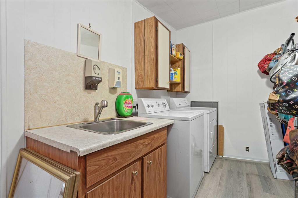 2 Westmount Drive, Cayley, AB - Indoor Photo Showing Laundry Room
