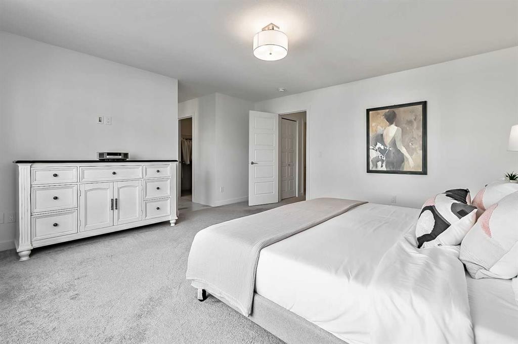 882 Bluerock Way Sw, Calgary, AB - Indoor Photo Showing Bedroom