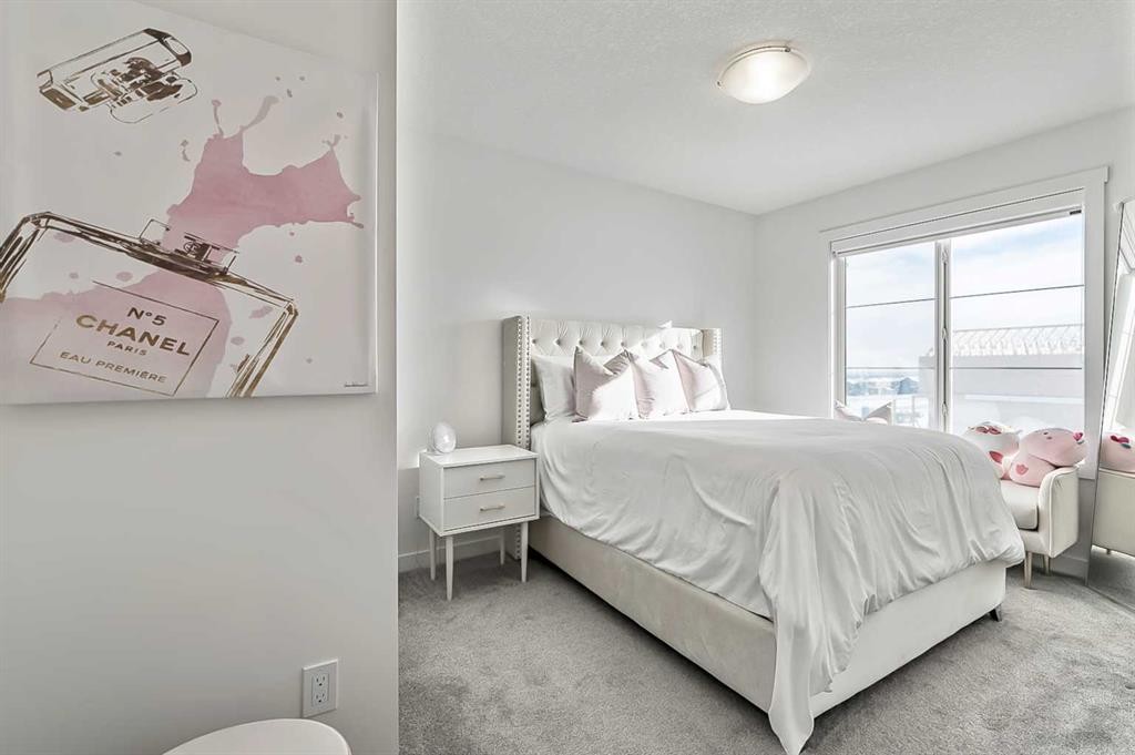 882 Bluerock Way Sw, Calgary, AB - Indoor Photo Showing Bedroom