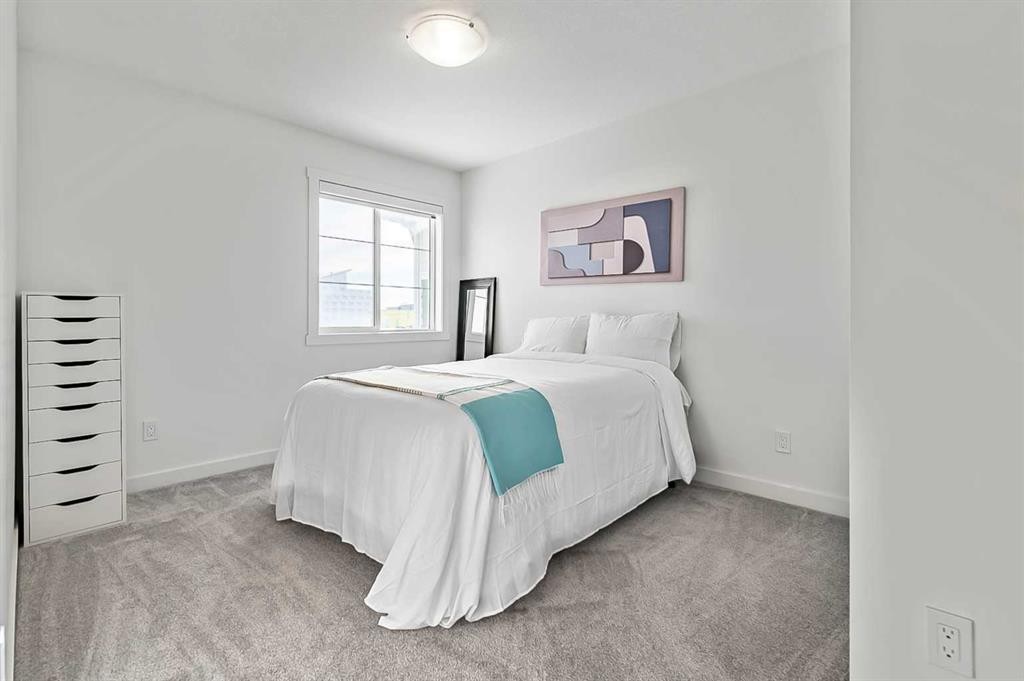 882 Bluerock Way Sw, Calgary, AB - Indoor Photo Showing Bedroom