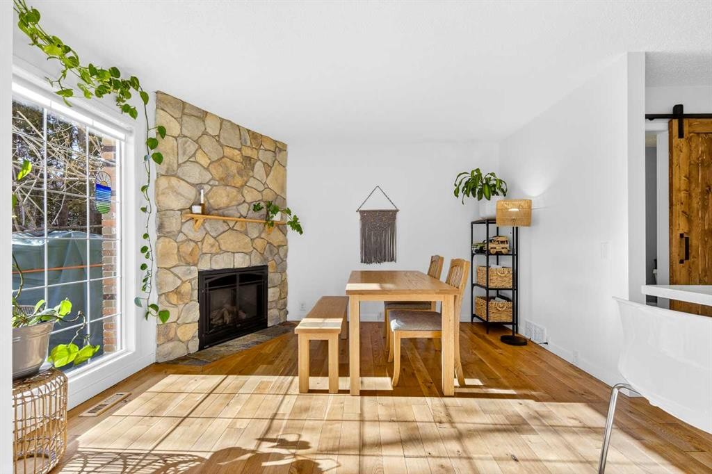 77 Point Drive Nw, Calgary, AB - Indoor With Fireplace