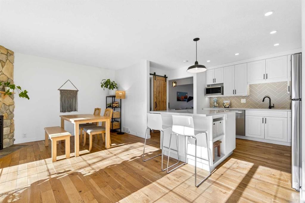 77 Point Drive Nw, Calgary, AB - Indoor Photo Showing Kitchen With Upgraded Kitchen