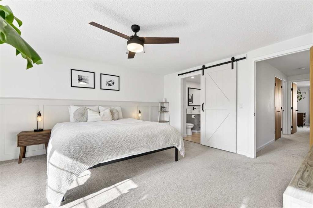 77 Point Drive Nw, Calgary, AB - Indoor Photo Showing Bedroom