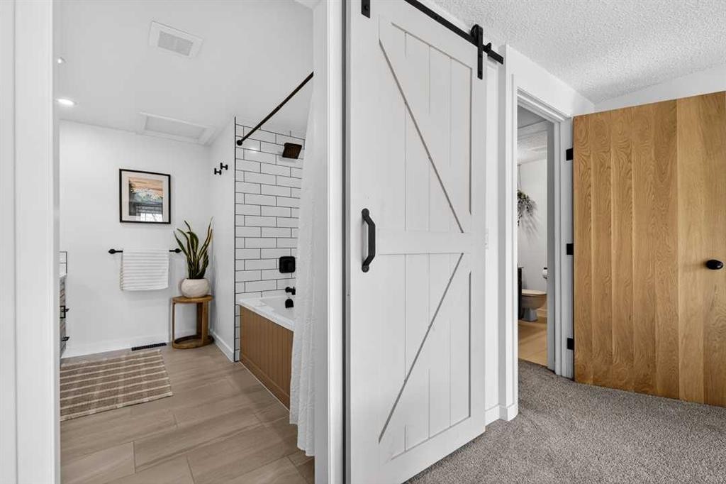 77 Point Drive Nw, Calgary, AB - Indoor Photo Showing Other Room